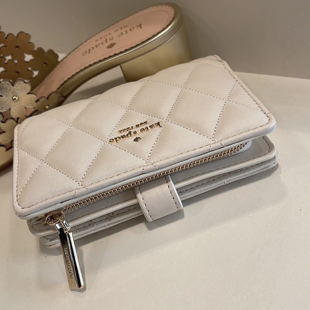 Kate Spade Carey Medium Compartment Bifold Wallet
COLOR: Parchment - Picture 8 of 16